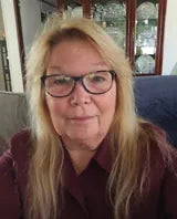 Smiling Vitalivv reviewer with glasses